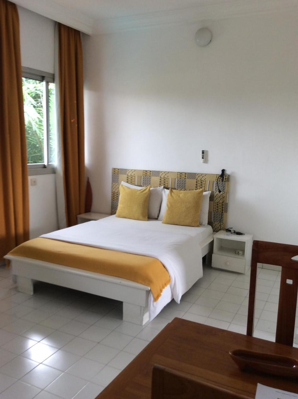 Residence Le Flamboyant Abidjan Buitenkant foto